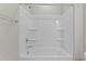 Clean bathroom with a white tub and shower at 121 Pearl St # 4, Garner, NC 27529