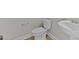 Simple bathroom with white sink and toilet at 121 Pearl St # 4, Garner, NC 27529