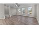 Bonus room featuring hardwood floors and a staircase at 121 Pearl St # 4, Garner, NC 27529