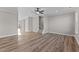 Spacious living room with hardwood floors and a staircase at 121 Pearl St # 4, Garner, NC 27529