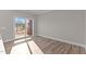 Bright office space with wood-look flooring and access to a private deck at 121 Pearl St # 4, Garner, NC 27529