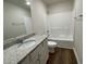 Clean bathroom with single vanity and shower/tub combo at 131 Tulipfield Way, Benson, NC 27504