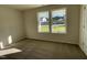 Bright bedroom featuring neutral walls and carpet at 131 Tulipfield Way, Benson, NC 27504