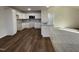 Open concept kitchen with island and granite countertops at 131 Tulipfield Way, Benson, NC 27504