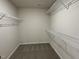 Spacious walk-in closet with wire shelving at 131 Tulipfield Way, Benson, NC 27504