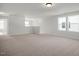 Spacious bonus room with carpeting and two windows at 238 Gregory Village Dr, Lillington, NC 27546