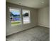 Bright bedroom with two large windows and neutral carpeting at 396 Magnolia Run Way, Benson, NC 27504