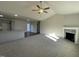 Spacious living room with high ceilings, fireplace, and hardwood floors at 396 Magnolia Run Way, Benson, NC 27504