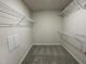 Large walk-in closet with wire shelving for storage at 396 Magnolia Run Way, Benson, NC 27504