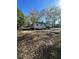 Ranch style home with a deck and large backyard at 445 N Dunn St, Angier, NC 27501
