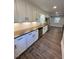 Modern kitchen with granite countertops and stainless steel appliances at 445 N Dunn St, Angier, NC 27501