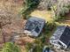 House with a large backyard and neighboring houses visible at 4505 Laymans Chapel Rd, Durham, NC 27704