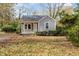 Gray house with a small front porch and yard at 4505 Laymans Chapel Rd, Durham, NC 27704
