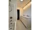 Updated bathroom with double vanity and shower/tub at 465 N Dunn St, Angier, NC 27501