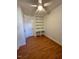 Bedroom with hardwood floors and built-in shelves at 465 N Dunn St, Angier, NC 27501
