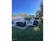 House exterior showcasing a side entrance and attached garage at 465 N Dunn St, Angier, NC 27501