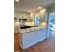 Modern kitchen featuring a breakfast bar and granite countertops at 465 N Dunn St, Angier, NC 27501