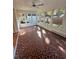 Bright sunroom features a tile floor and ample windows at 465 N Dunn St, Angier, NC 27501
