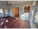 Sunroom with terracotta tile floor and ample natural light at 465 N Dunn St, Angier, NC 27501