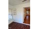 Sunroom offers a view into the kitchen and dining areas at 465 N Dunn St, Angier, NC 27501