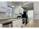 Kitchen with white cabinets, hardwood floors, and ample counter space at 1009 Athens Drive Dr, Raleigh, NC 27606