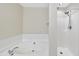 Bathroom featuring a garden tub and a shower at 10132 Blackwell Dr, Raleigh, NC 27617