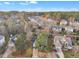 Aerial view of neighborhood showcasing homes and landscape at 110 Modena Dr, Cary, NC 27513