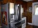 Stainless steel refrigerator in the kitchen at 118 Southern Ave, Henderson, NC 27536