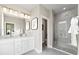 Spa-like bathroom with double vanity, walk-in shower, and separate toilet at 1500 Village Hall Ln # 39, Wake Forest, NC 27587