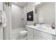 Clean bathroom with a white vanity, marble shower, and bathtub at 1500 Village Hall Ln # 39, Wake Forest, NC 27587