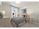Cozy bedroom with polka dot bedding and plenty of natural light at 1500 Village Hall Ln # 39, Wake Forest, NC 27587