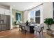 Elegant dining area with a round table and modern chairs at 1500 Village Hall Ln # 39, Wake Forest, NC 27587