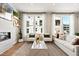 Bright living room with comfortable seating and a marble coffee table at 1500 Village Hall Ln # 39, Wake Forest, NC 27587