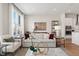 Open living area with light walls, comfortable seating, and access to the kitchen at 1500 Village Hall Ln # 39, Wake Forest, NC 27587