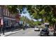 View of Wake Forest downtown street with shops and parked cars at 1508 Village Hall Ln, Wake Forest, NC 27587