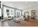 Spacious living room with hardwood floors, comfortable seating, and stylish decor at 1508 Village Hall Ln, Wake Forest, NC 27587