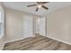 Spacious bedroom with double closets and ceiling fan at 1518 Parks Village Rd, Zebulon, NC 27597
