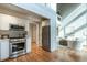 Modern kitchen with stainless steel appliances and hardwood floors at 4824 Sandberry Ln, Raleigh, NC 27613