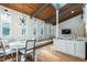 Modern kitchen featuring white cabinets, granite counters, and stainless steel appliances at 4824 Sandberry Ln, Raleigh, NC 27613