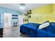 Bedroom with blue bedding, yellow and blue walls, and a dresser at 533 Haywood Glen Dr, Knightdale, NC 27545