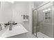 Clean bathroom with a shower, vanity, and neutral tones at 10529 Pleasant Branch Dr # 201, Raleigh, NC 27614