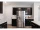 Stainless steel appliances and granite countertops in this modern kitchen at 1069 River Glade Ct, Graham, NC 27253