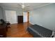 Well-lit bedroom with hardwood floors and ample closet space at 127 Dogwood Dr, Burlington, NC 27215