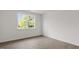 Well-lit bedroom with hardwood floors and a large window at 1680 Abberly Pl, Graham, NC 27253