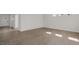 Bright living room with hardwood floors and access to front entry at 1680 Abberly Pl, Graham, NC 27253