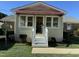 House exterior with awning and white steps at 209 S Eastwood Dr, Benson, NC 27504