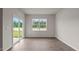 Bright office with sliding glass doors leading to the backyard at 2508 Trevana Way, Graham, NC 27253