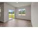 Bright office with hardwood floors, large window, and sliding glass door at 2508 Trevana Way, Graham, NC 27253