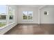 Bright and airy living room with large windows overlooking the neighborhood at 302 Sailfish Ct, Durham, NC 27703