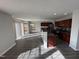 Kitchen with dark wood cabinets, granite countertops, and stainless steel appliances at 305 Pebblestone Dr, Durham, NC 27703